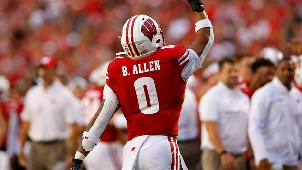 Wisconsin running back Braelon Allen pointing to the sky to honor former running backs coach Gary Brown.