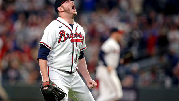 Oct 23, 2021; Cumberland, Georgia, USA; Atlanta Braves relief pitcher Tyler Matzek (68) reacts after striking out three batters with the bases loaded during the seventh inning against the Los Angeles Dodgers in game six of the 2021 NLCS at Truist Park.
