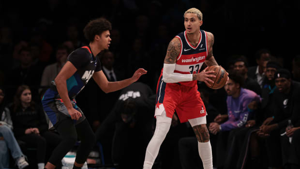 Washington Wizards forward Kyle Kuzma (33) is guarded by Brooklyn Nets forward Cameron Johnson (2) during the first quarter at Barclays Center. 
