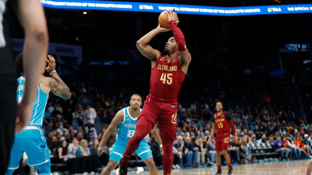 Mar 12, 2023; Charlotte, North Carolina, USA; Cleveland Cavaliers guard Donovan Mitchell (45) attempts a jump shot during the first half against the Charlotte Hornets at Spectrum Center. Mandatory Credit: Brian Westerholt-USA TODAY Sports