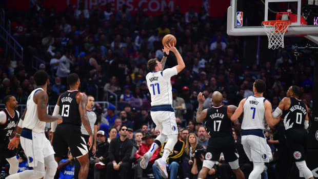 Dallas Mavs star Luka Doncic puts up a floater against the Los Angeles Clippers.