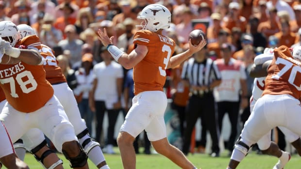 Texas Longhorns quarterback Quinn Ewers (3) throws a pass during the Red River Rivalry college football game between the University of Oklahoma Sooners (OU) and the University of Texas (UT) Longhorns