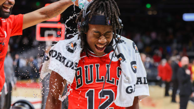 Chicago Bulls guard Ayo Dosunmu has water poured on him after making a game-winning basket against the Atlanta Hawks