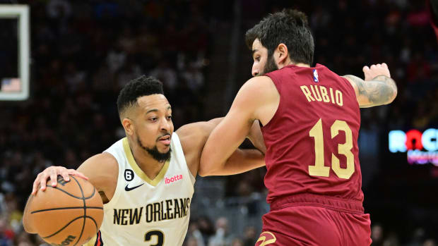 Jan 16, 2023; Cleveland, Ohio, USA; New Orleans Pelicans guard CJ McCollum (3) drives to the basket against Cleveland Cavaliers guard Ricky Rubio (13) during the second half at Rocket Mortgage FieldHouse. Mandatory Credit: Ken Blaze-USA TODAY Sports