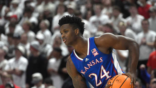 Kansas' guard KJ Adams, Jr. (24) looks to pass the ball against Texas Tech in a Big 12 basketball game, Monday, Feb. 12, 2024, at United Supermarkets Arena.  
