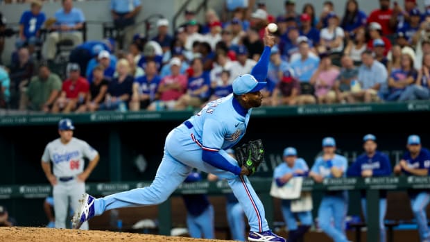 Jul 23, 2023; Arlington, Texas, USA; Texas Rangers relief pitcher Aroldis Chapman (45) throws during the eighth inning against the Los Angeles Dodgers at Globe Life Field. Mandatory Credit: Kevin Jairaj-USA TODAY Sports
