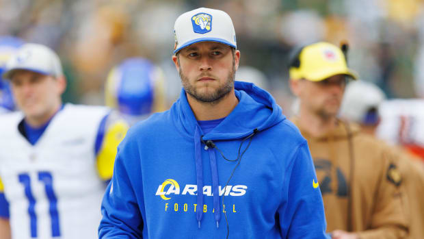 Los Angeles Rams quarterback Matthew Stafford looks on from the sidelines prior to the game against the Green Bay Packers at Lambeau Field.