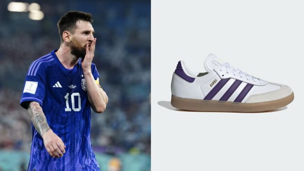 Lionel Messi next to his white and purple adidas Samba sneakers.