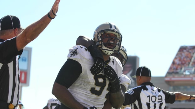 New Orleans Saints defensive end Cameron Jordan (94) reacts after he stopped the Tampa Bay Buccaneers on fourth down and goal during the second half at Raymond James Stadium. New Orleans Saints defeated the Tampa Bay Buccaneers 35-28. Mandatory Credit: Kim Klement-USA TODAY Sports
