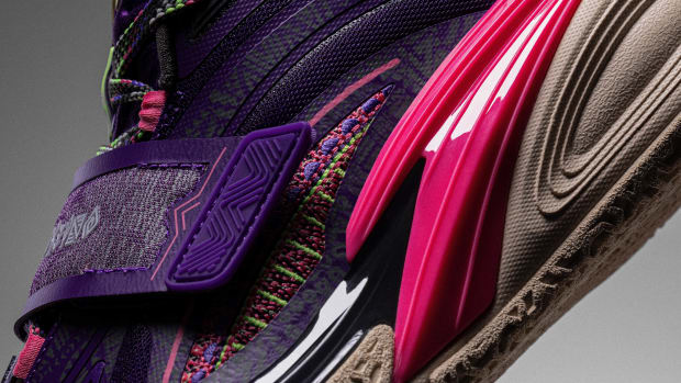 The side of Kyrie Irving's purple and red ANTA shoe.