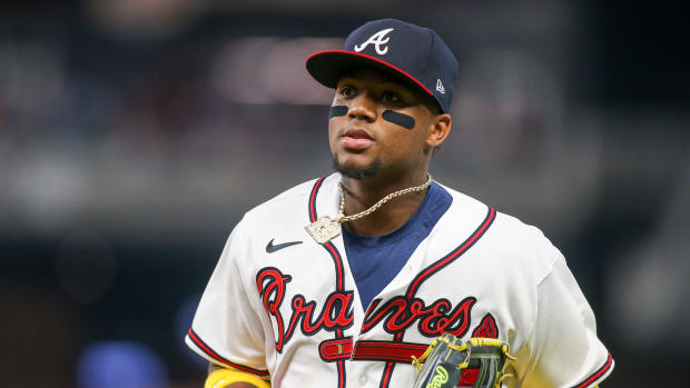 Apr 28, 2022; Atlanta, Georgia, USA; Atlanta Braves right fielder Ronald Acuna Jr. (13) runs to the dugout against the Chicago Cubs in the sixth inning at Truist Park.
