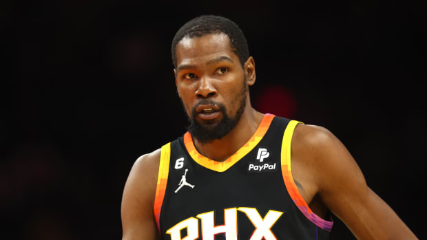 Phoenix Suns forward Kevin Durant looks on during a game.