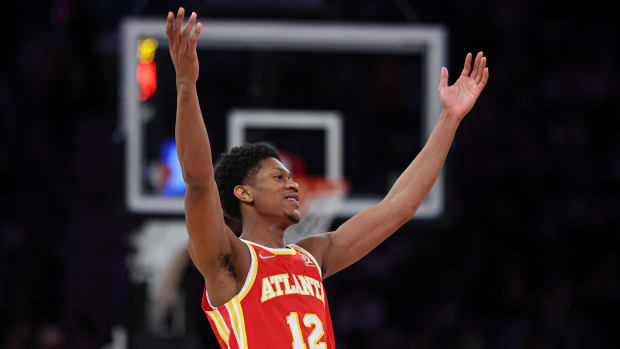 Atlanta Hawks forward De'Andre Hunter (12) reacts after a basket against the New York Knicks during the second half at Madison Square Garden.