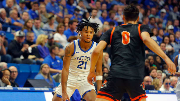 Kentucky s D.J. Wagner brings the ball up court against Georgetown s Cam Brooks-Harris in Rupp Arena. Oct 27, 2023
