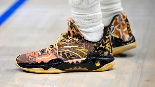 Dallas Mavericks guard Kyrie Irving's cheetah-print ANTA sneakers.