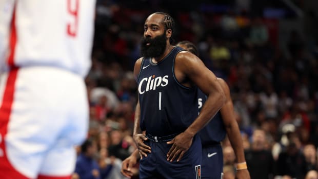 Clippers guard James Harden reacts after making a game winning three-point basket during the fourth quarter against the Houston Rockets.