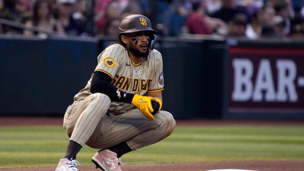 San Diego Padres outfielder Fernando Tatis Jr. leads off third base during a game.