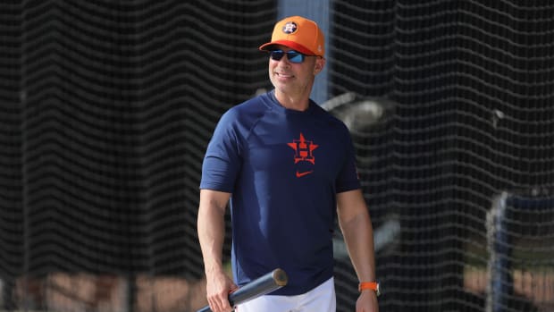 Feb 16, 2024; West Palm Beach, FL, USA; Houston Astros manager Joe Espada (19) looks on during spring training practice at CACTI Park of the Palm Beaches.