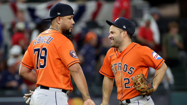 Oct 19, 2023; Arlington, Texas, USA; Houston Astros first baseman Jose Abreu (79) and second baseman Jose Altuve (27) celebrate after defeating the Texas Rangers in game four of the ALCS for the 2023 MLB playoffs at Globe Life Field. Mandatory Credit: Kevin Jairaj-USA TODAY Sports  