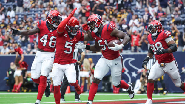 Texans defensive end Will Anderson Jr. (51) and safety Jalen Pitre (5) react after a play during the fourth quarter against the Pittsburgh Steelers at NRG Stadium.