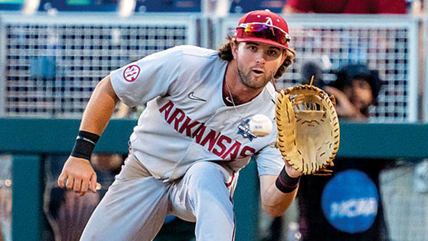 Arkansas Razorbacks first baseman Peyton Stovall (10) gets an out against the Auburn Tigers to end the seventh inning at Charles Schwab Field.