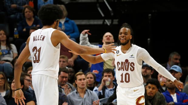 Jan 18, 2023; Memphis, Tennessee, USA; Cleveland Cavaliers guard Darius Garland (10) reacts with Cleveland Cavaliers center Jarrett Allen (31) during the second half against the Memphis Grizzlies at FedExForum. Mandatory Credit: Petre Thomas-USA TODAY Sports