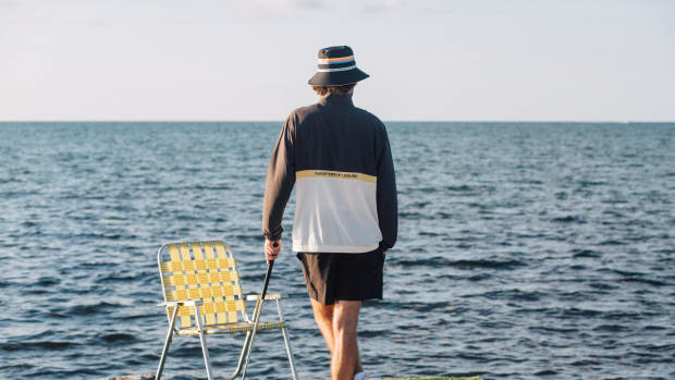 Rickie Fowler models Puma Golf apparel on a beach.