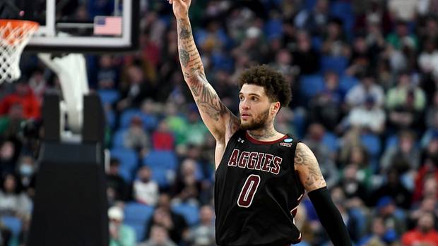 New Mexico State Aggies guard Teddy Allen (0) celebrates as the Aggies defeated the Connecticut Huskies 70-63 during the first round of the 2022 NCAA Tournament at KeyBank Center.
