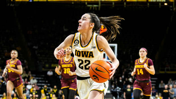 Iowa guard Caitlin Clark (22) drives to the basket during a NCAA Big Ten Conference women's basketball game against Minnesota, Wednesday, Feb. 9, 2022, at Carver-Hawkeye Arena in Iowa City, Iowa.