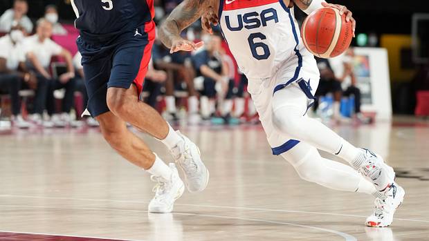 Team USA guard Damian Lillard dribbles past a defender during the 2020 Olympic Summer Games.