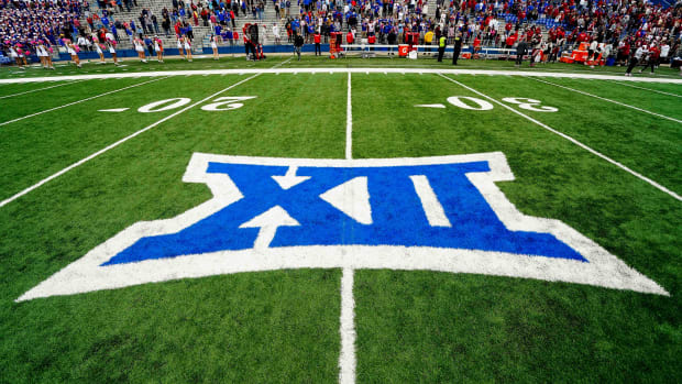 Oct 23, 2021; Lawrence, Kansas, USA; A general view of the Big 12 Conference logo on the field after the game between the Kansas Jayhawks and the Oklahoma Sooners at David Booth Kansas Memorial Stadium. Mandatory Credit: Jay Biggerstaff-USA TODAY Sports