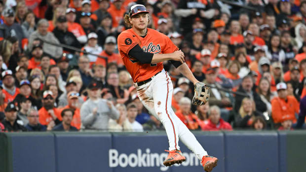 Oct 8, 2023; Baltimore, Maryland, USA; Baltimore Orioles third baseman Gunnar Henderson (2) throws to first base during game two of the ALDS for the 2023 MLB playoffs against the Texas Rangers at Oriole Park at Camden Yards.