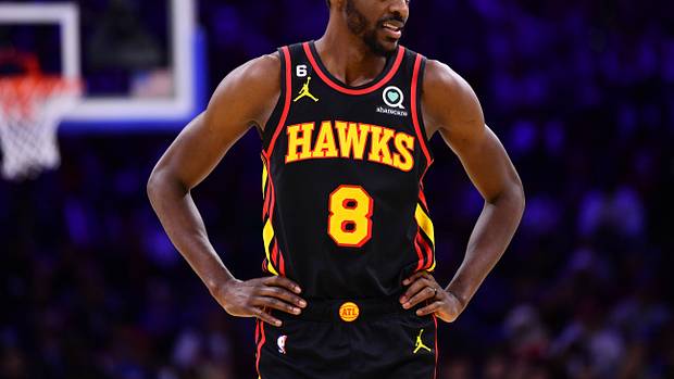 Justin Holiday looks on during a game.