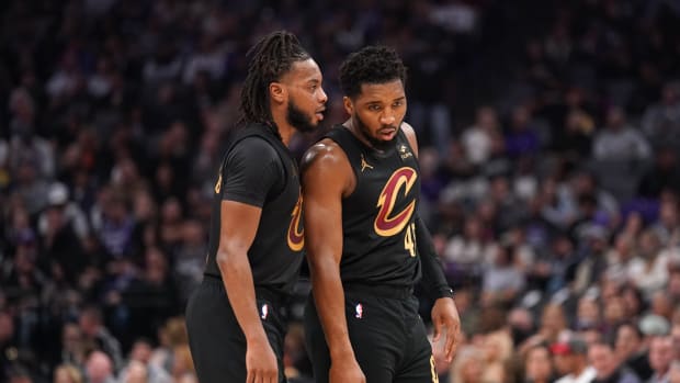 Nov 13, 2023; Sacramento, California, USA; Cleveland Cavaliers guard Darius Garland (10) talks with guard Donovan Mitchell (45) before a free throw attempt against the Sacramento Kings in the second quarter at the Golden 1 Center.
