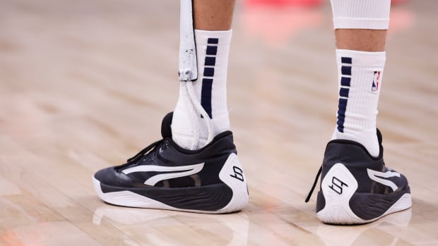 Denver Nuggets forward Michael Porter Jr.'s black and white PUMA sneakers.
