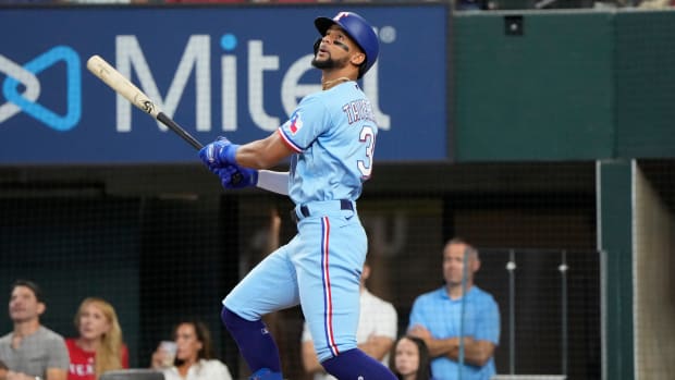 Aug 28, 2022; Arlington, Texas, USA; Texas Rangers center fielder Leody Taveras (3) follows through for a double against the Detroit Tigers during the fifth inning at Globe Life Field. Mandatory Credit: Jim Cowsert-USA TODAY Sports