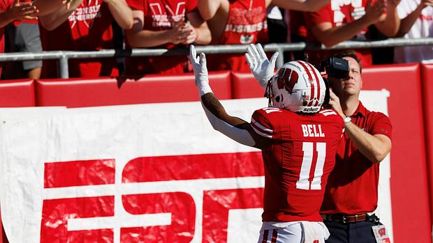 Wisconsin wide receiver Skyler Bell celebrates a touchdown with the student section.
