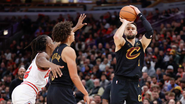 Dec 23, 2023; Chicago, Illinois, USA; Cleveland Cavaliers guard Max Strus (1) shoots against the Chicago Bulls during the second half at United Center. Mandatory Credit: Kamil Krzaczynski-USA TODAY Sports