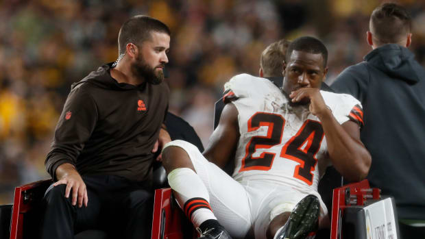 Sep 18, 2023; Pittsburgh, Pennsylvania, USA; Cleveland Browns running back Nick Chubb (24) is taken from the field on a cart after suffering an apparent injury against the Pittsburgh Steelers during the second quarter at Acrisure Stadium.
