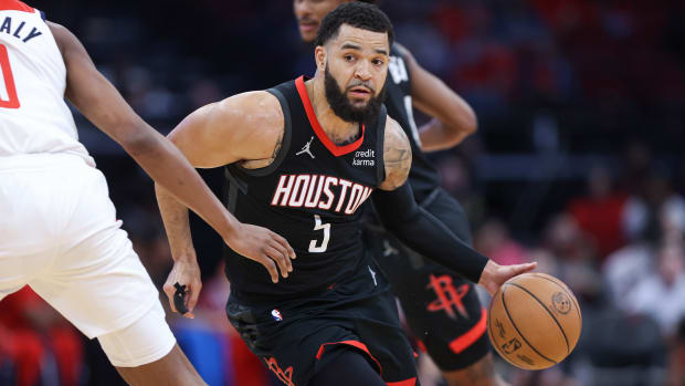 Rockets guard Fred VanVleet (5) dribbles the ball during the first quarter against the Washington Wizards at Toyota Center.