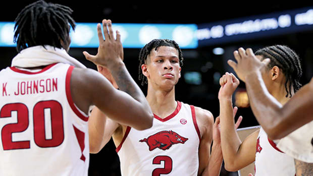 Arkansas Razorbacks forward Trevon Brazile celebrates with teammates as he leaves the game in the second half against the San Jose State Spartans at Bud Walton Arena