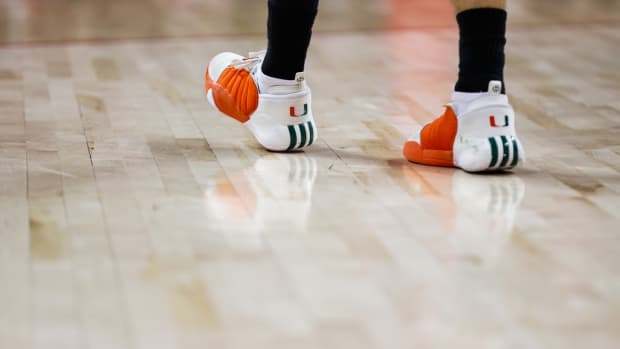 James Harden's white, orange, and green 'Miami Hurricanes' adidas sneakers.