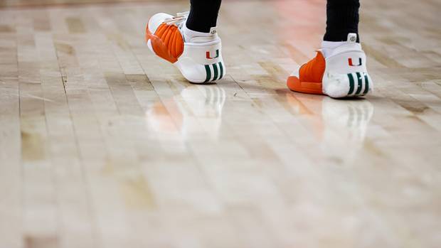 James Harden's white, orange, and green 'Miami Hurricanes' adidas sneakers.