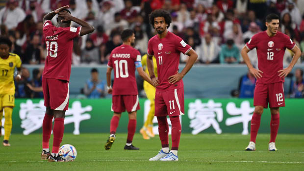 Players from Qatar pictured looking dejected during their loss to Ecuador in the opening game of the 2022 World Cup