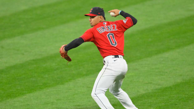 Aug 15, 2022; Cleveland, Ohio, USA; Cleveland Guardians second baseman Andres Gimenez (0) throws to first base in the sixth inning against the Detroit Tigers at Progressive Field. Mandatory Credit: David Richard-USA TODAY Sports