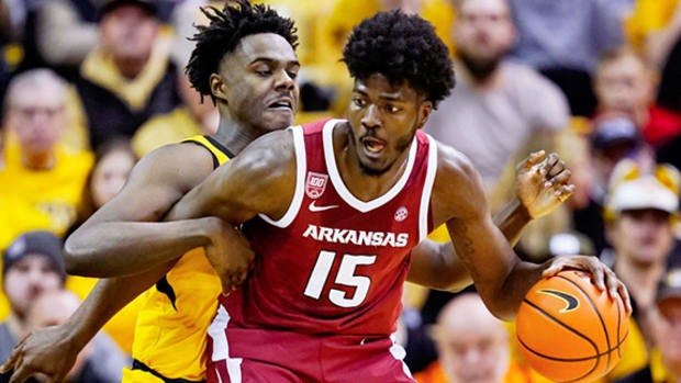 Arkansas center Makhi Mitchell works inside against Missouri on the road in Columbia.