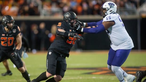 Nov 13, 2021; Stillwater, Oklahoma, USA; TCU Horned Frogs offensive tackle Obinna Eze (55) blocks Oklahoma State Cowboys defensive tackle Brendon Evers (98) during the second quarter at Boone Pickens Stadium.