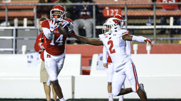 Wisconsin cornerback Ricardo Hallman breaking up a pass against Rutgers (Credit: Vincent Carchietta-USA TODAY Sports)