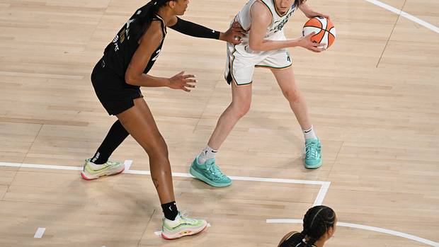 Las Vegas Aces forward A'Ja Wilson defends New York Liberty forward Breanna Stewart.