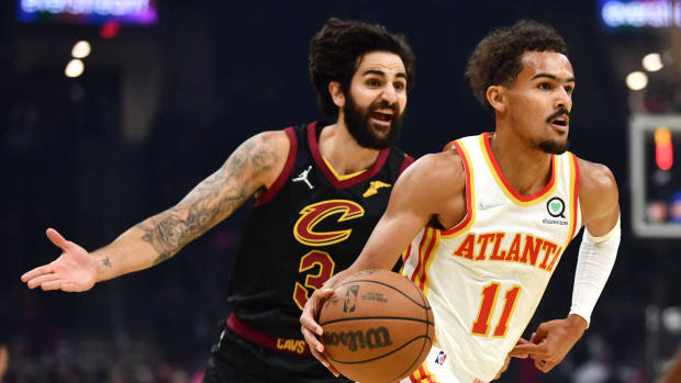 Atlanta Hawks guard Trae Young (11) drives to the basket against Cleveland Cavaliers guard Ricky Rubio (3) during the first quarter at Rocket Mortgage FieldHouse.